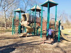 Playground structure with twisty slide at Scioto Park.