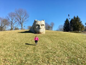 A child on the hill near Leatherlips in Scioto Park.
