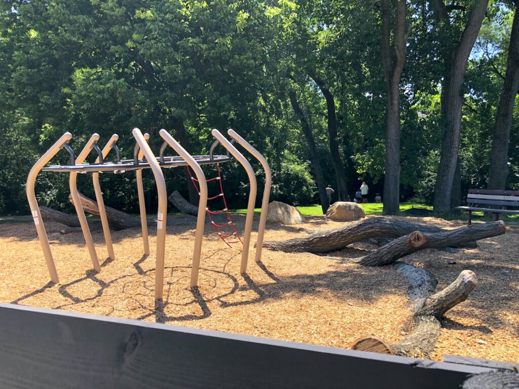 Monkey bars and logs to climb on at Gantz Park.