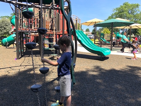 Boy on climbing ropes at Gantz Park.