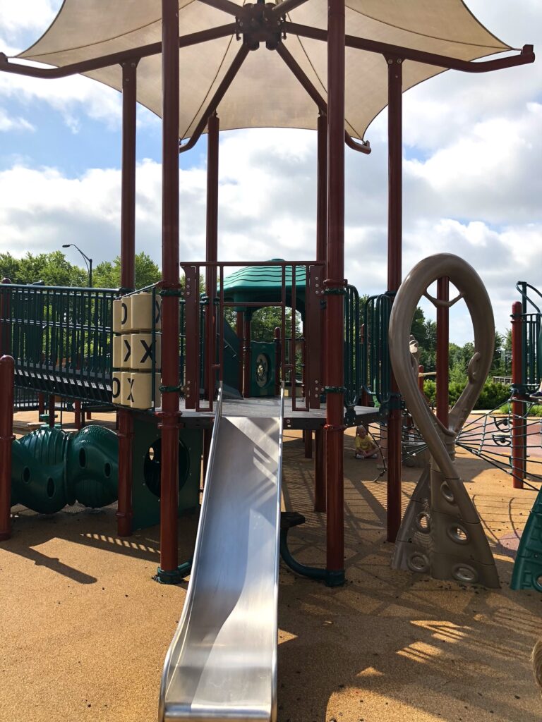 A metal slide on the play structure.