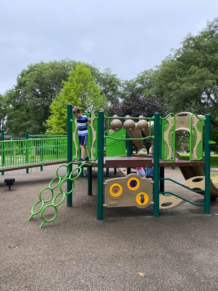 A boy playing at the playground in Goodale Park.