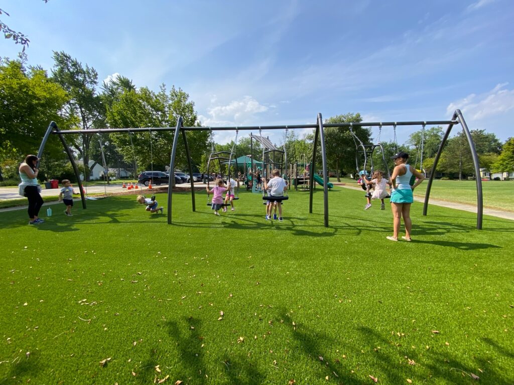 Kids on swings at Selby Park.
