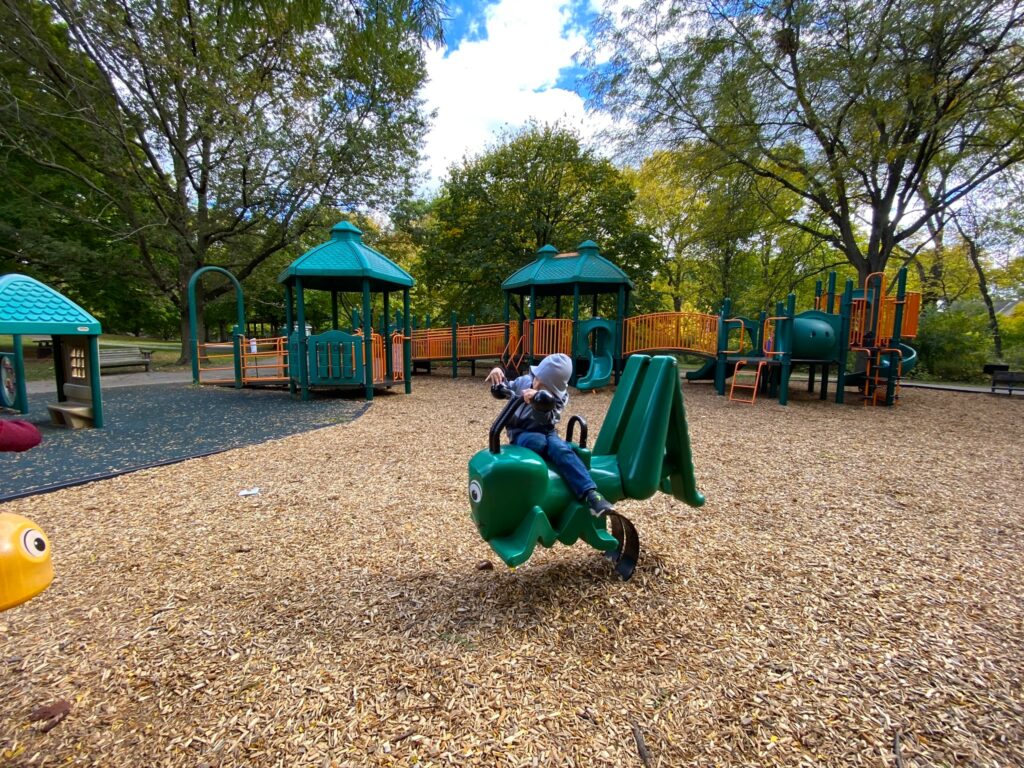 A boy on the playground at Fancyburg Park in Upper Arlington.