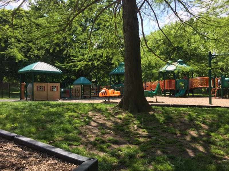 A long view of the middle-sized play structure at Fancyburg Park.