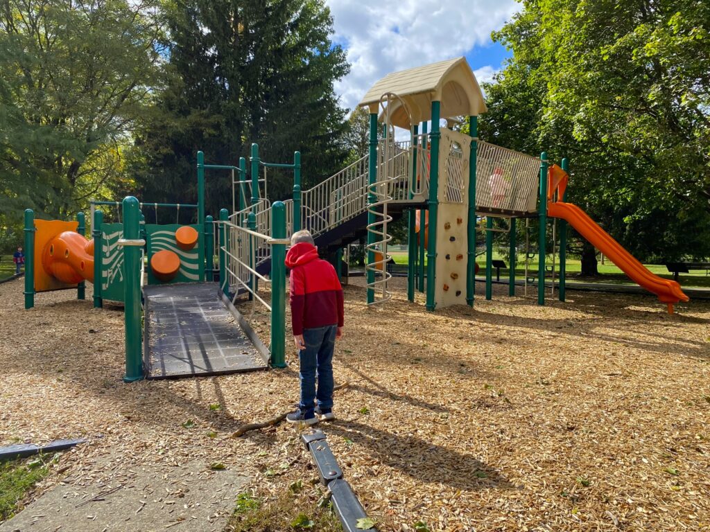 A boy on the playground at Fancyburg Park in Upper Arlington.