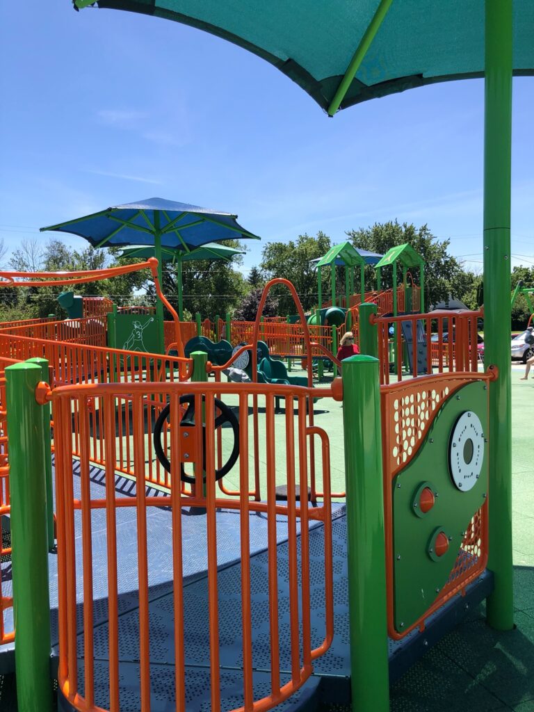 A steering wheel and other interactive elements on Dream Field Playground.