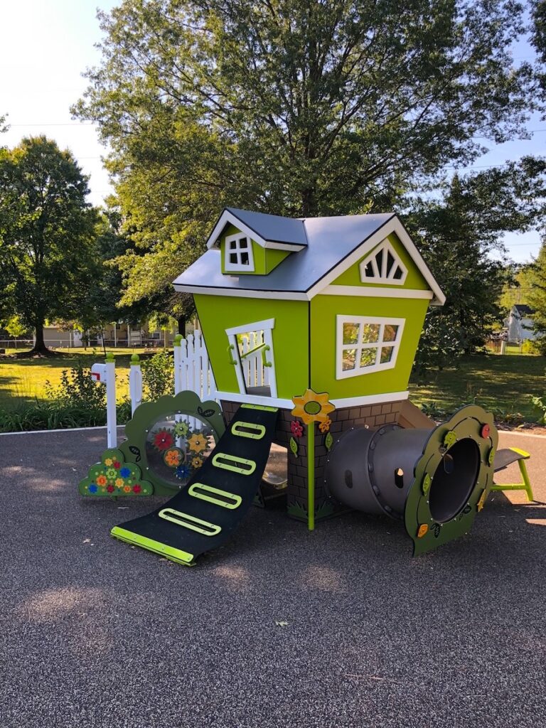 A cute, green playhouse for toddlers at Towers Park in Westerville, Ohio.