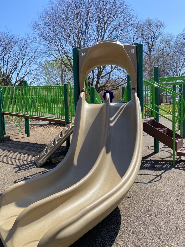 A double slide on the playground.