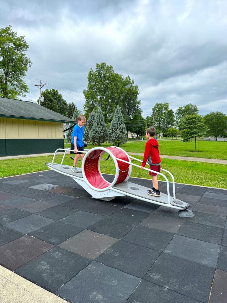 Two boys on a teeter-totter at McCorkle Park in Gahanna.