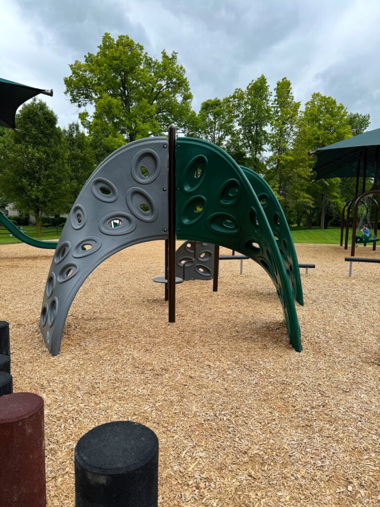 A climbing structure at the park.