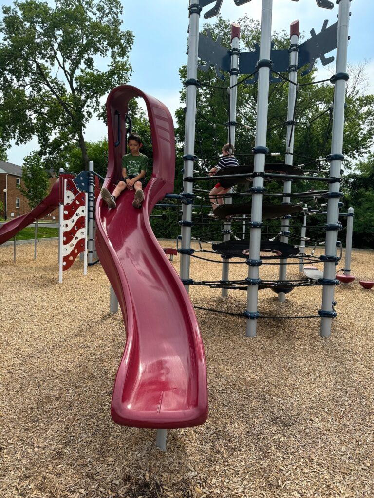 Boys on the playground at Schneider Park in Bexley, Ohio.