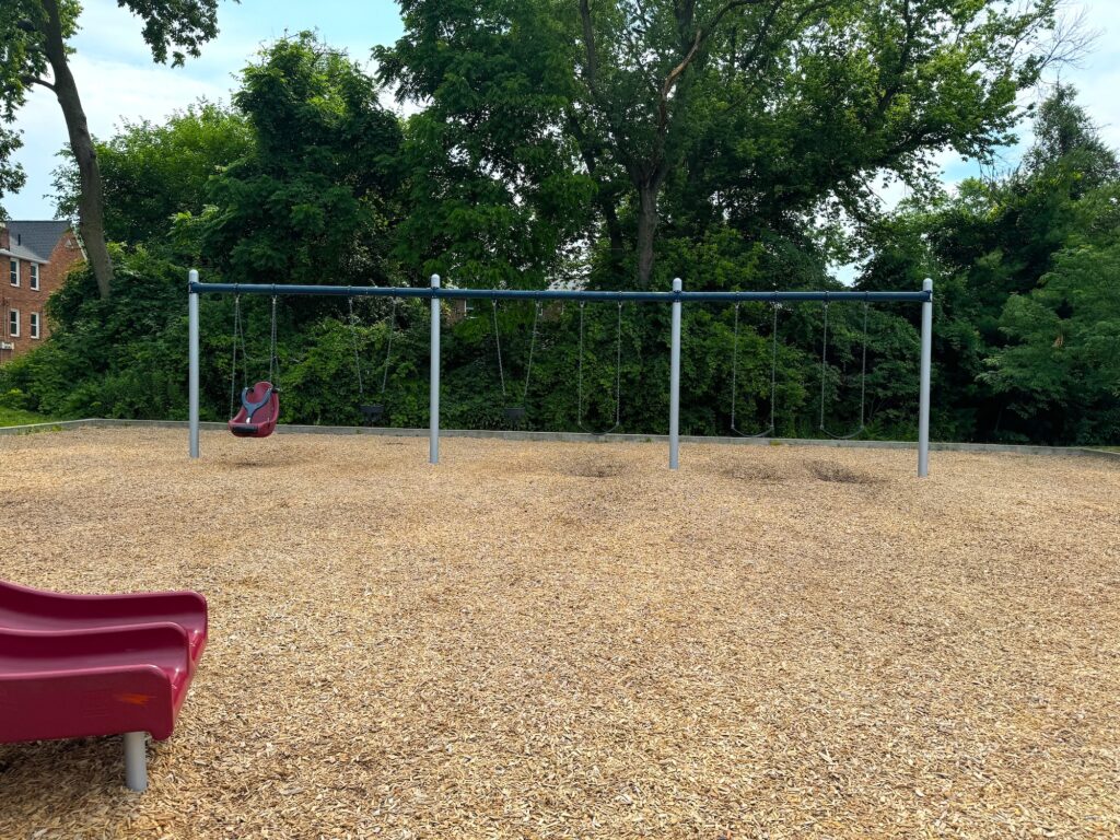 A set of swings at Schneider Park in Bexley, Ohio.