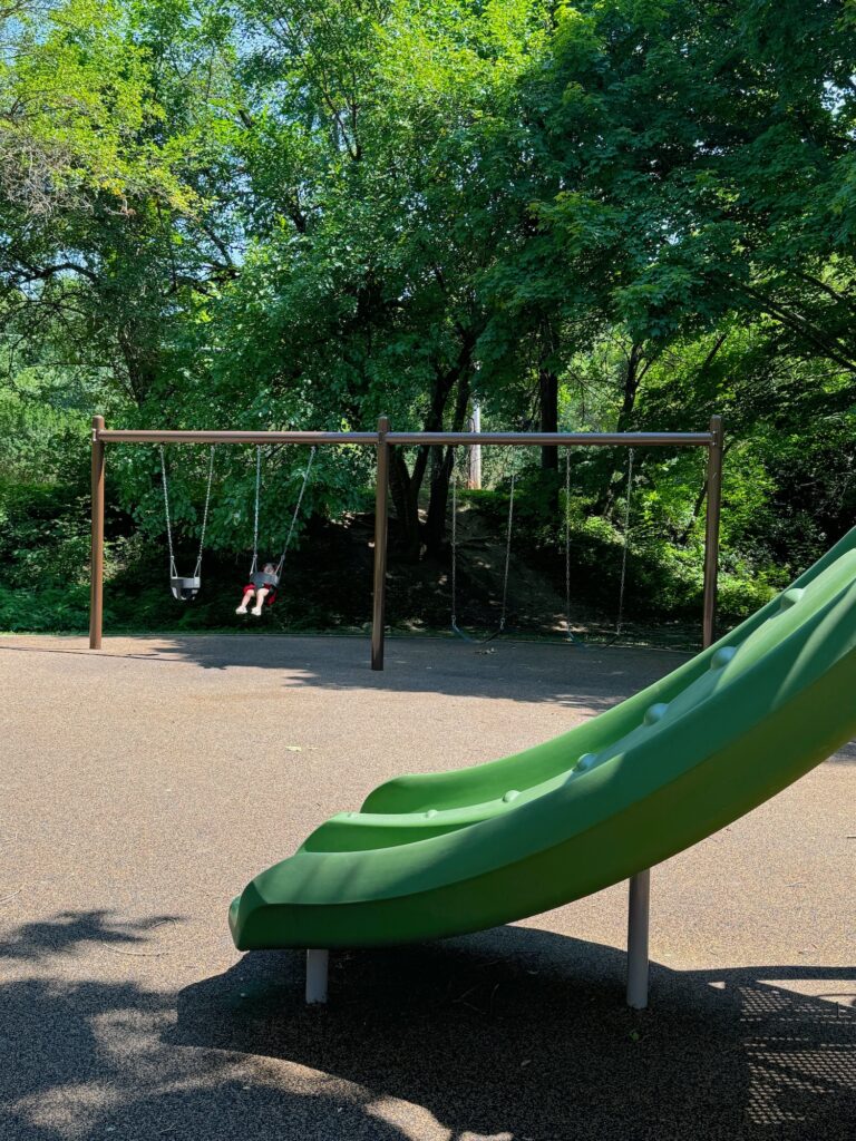 A set of swings at Oxford Park.